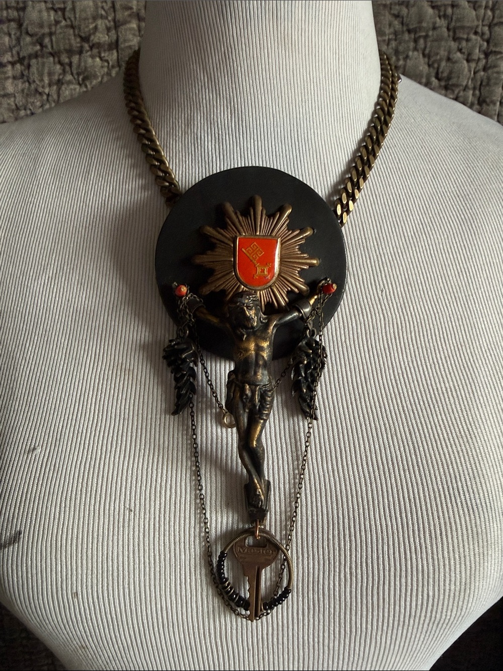 Bronze Crucifix Pendant Necklace with Red Shield Accent